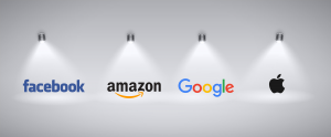 an image of light shining on the logos of Facebook, Amazon, Google and Apple to signify big tech